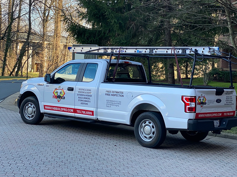 Fab build pro truck parked in front of driveway