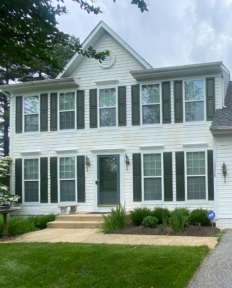 white home with windows and white siding