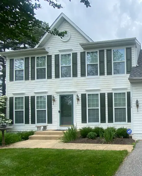 white home with windows and white siding