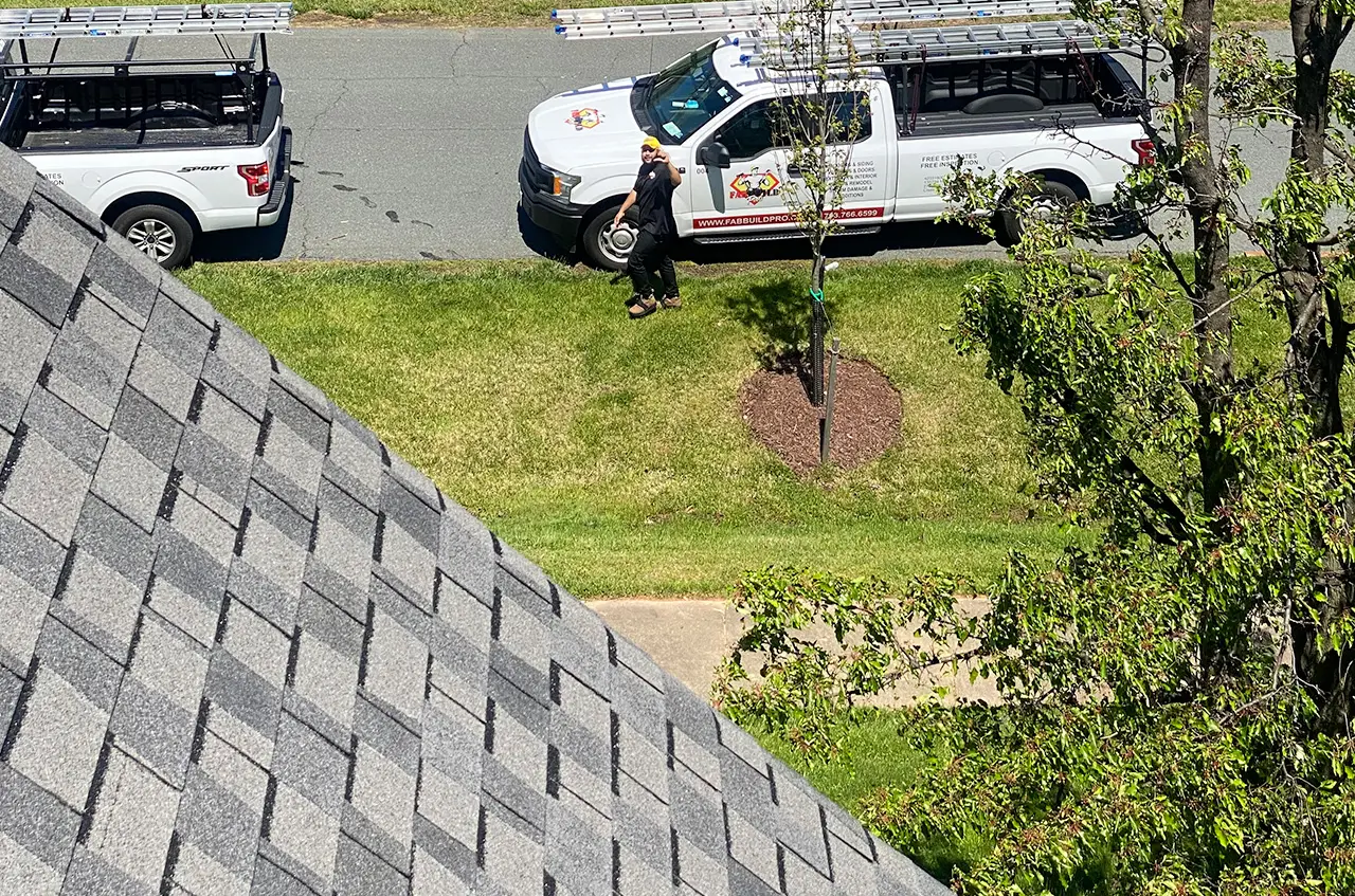 fab build pro roofing team waving at camera