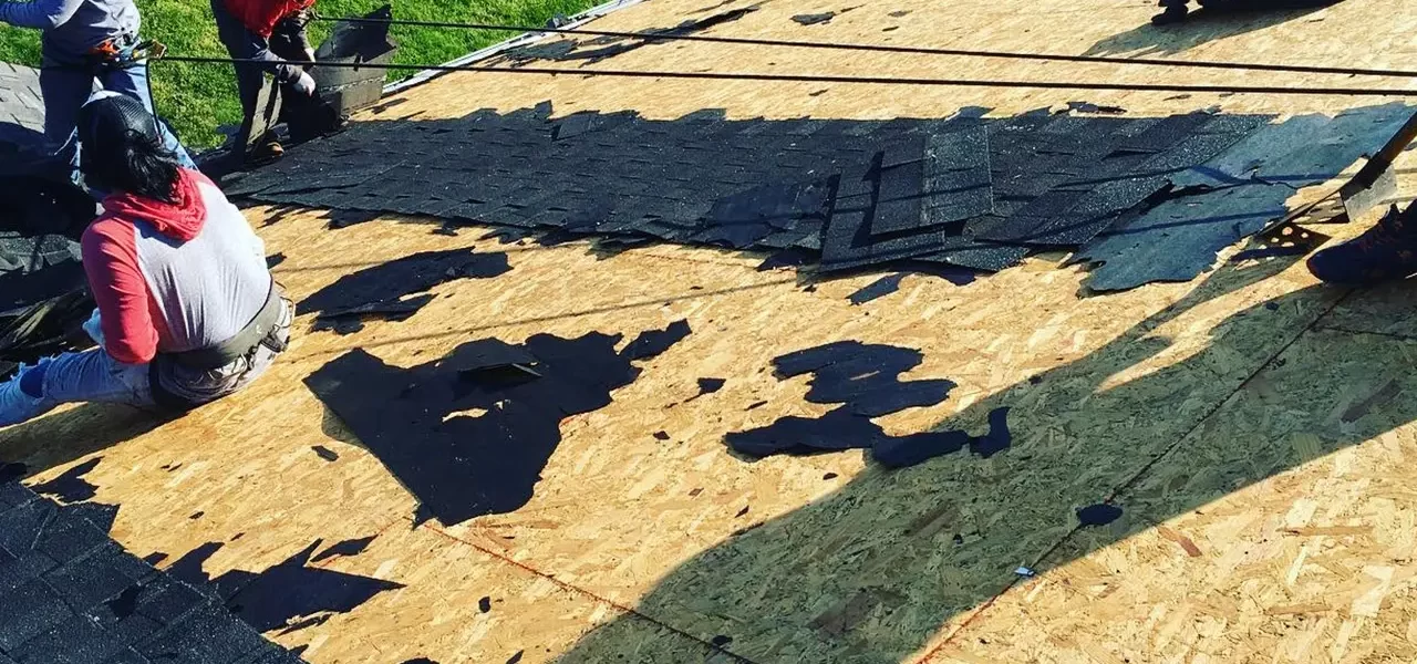 Fab build pro roofing team changing shingles